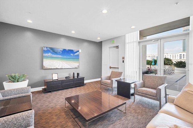 living room with carpet flooring and french doors