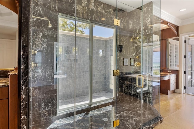 bathroom featuring crown molding and a shower with shower door