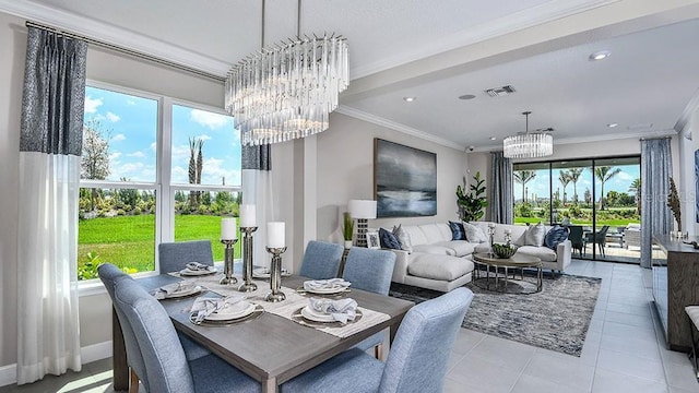 dining area with light tile patterned floors, ornamental molding, and a chandelier