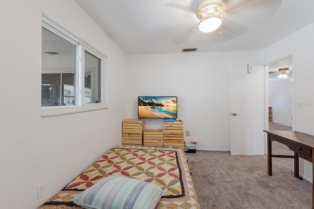 bedroom featuring ceiling fan, carpet, and visible vents