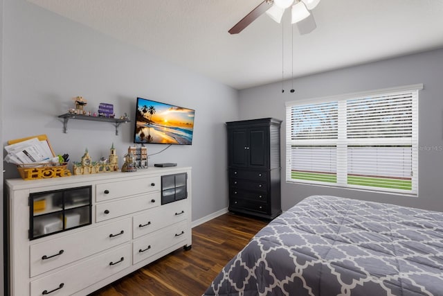 bedroom featuring dark hardwood / wood-style floors and ceiling fan