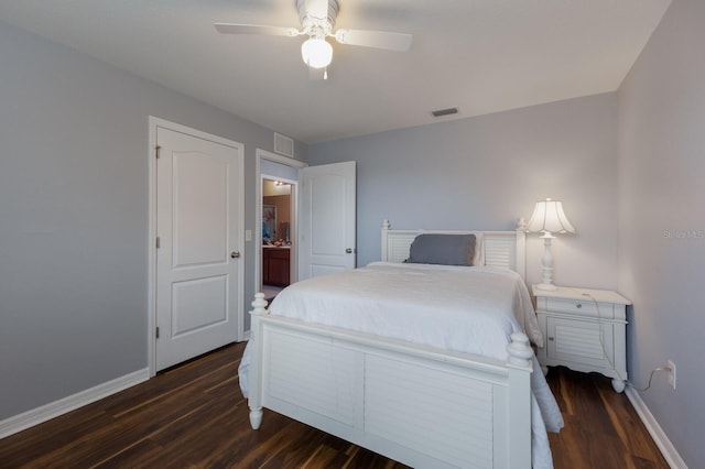 bedroom with dark wood-type flooring and ceiling fan