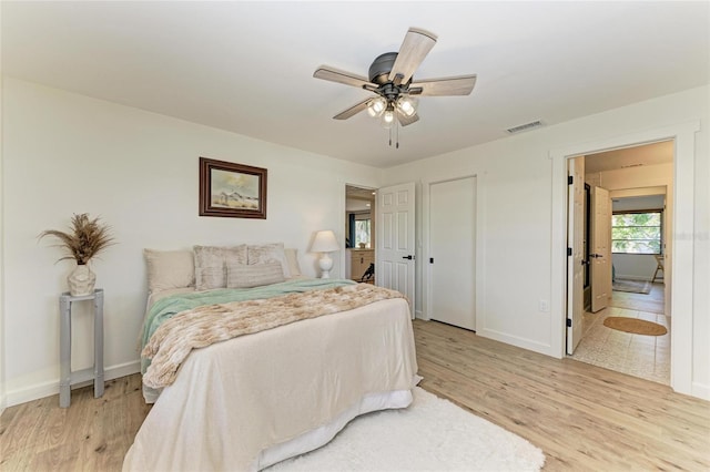 bedroom featuring ceiling fan and light wood-type flooring