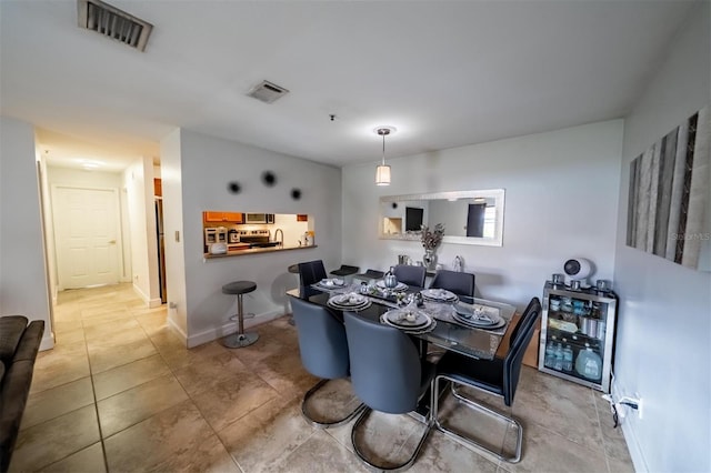 view of tiled dining space