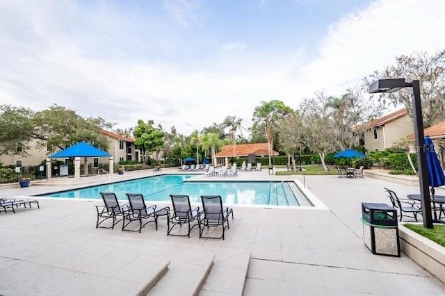 view of pool featuring a gazebo and a patio area