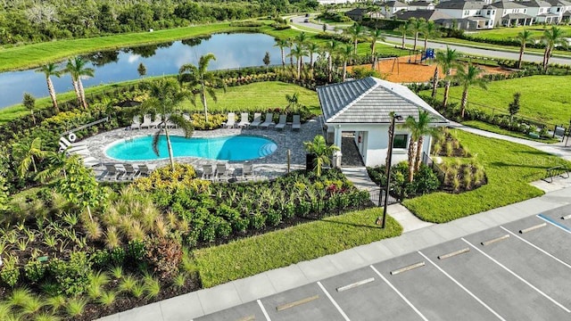 birds eye view of property featuring a water view