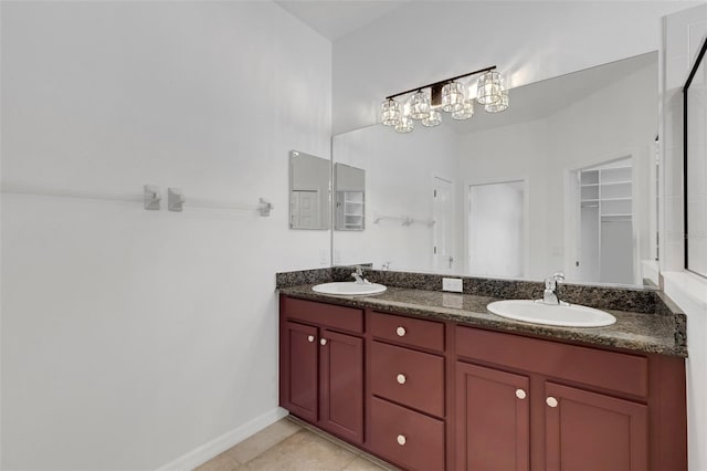 bathroom with vanity and tile patterned floors