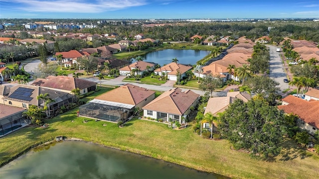 drone / aerial view with a water view