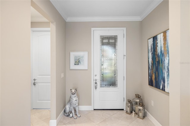 tiled foyer entrance with crown molding