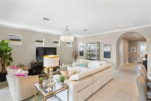 living room with crown molding, a notable chandelier, and light tile patterned floors