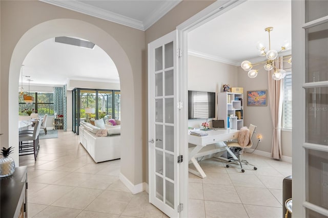 office space featuring light tile patterned floors, ornamental molding, and a chandelier