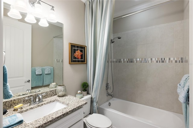 full bathroom with shower / tub combo with curtain, vanity, and toilet