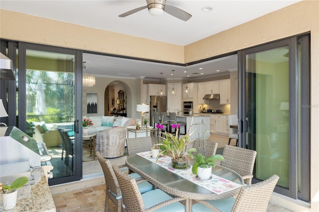 interior space featuring ceiling fan