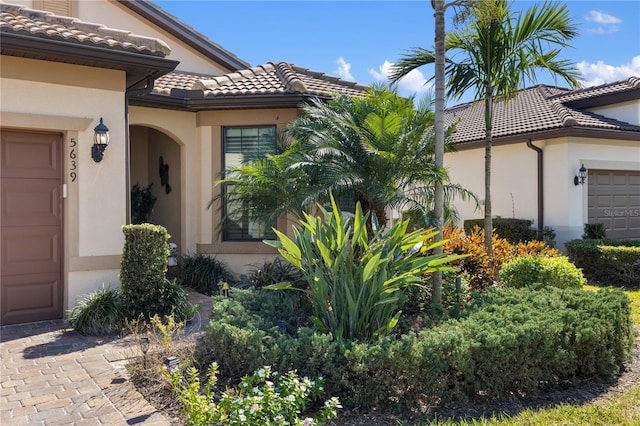 property entrance featuring a garage