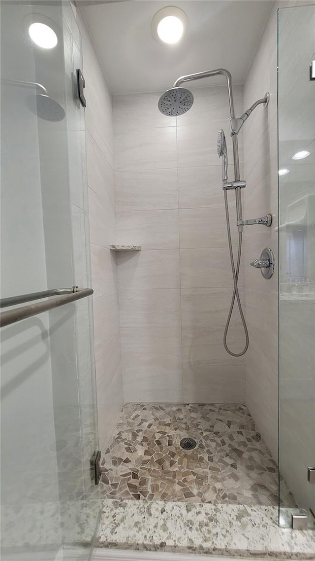 bathroom with an enclosed shower