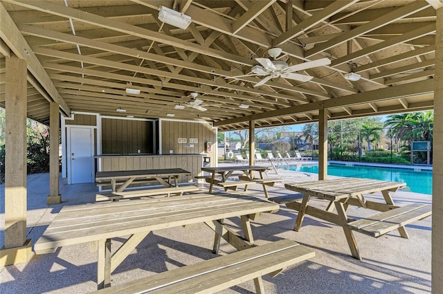 view of patio / terrace featuring a community pool and ceiling fan