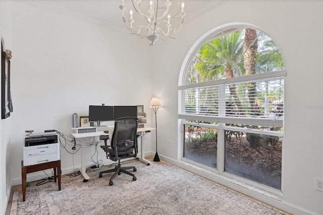 office with crown molding and a notable chandelier