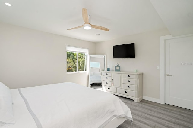 bedroom featuring ceiling fan and light wood-type flooring