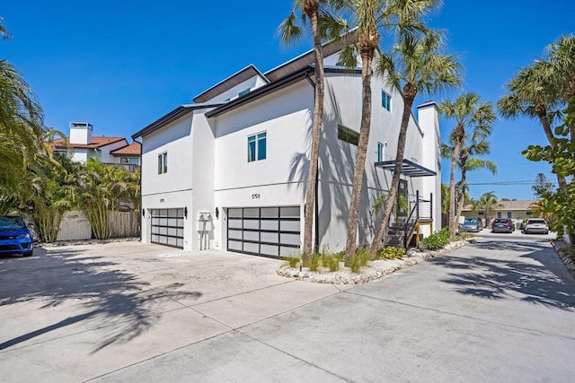 view of property exterior with a garage