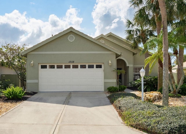 single story home with a garage