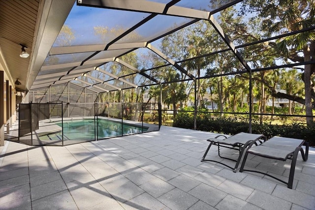 view of pool featuring a lanai and a patio area