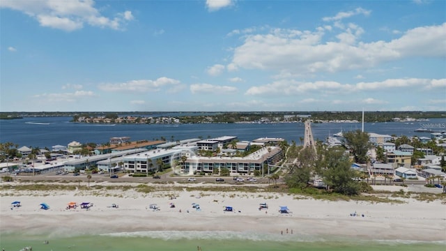 bird's eye view featuring a beach view and a water view