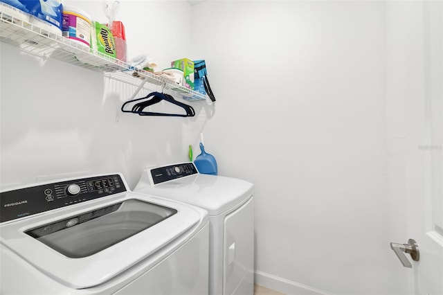 laundry area with washer and dryer