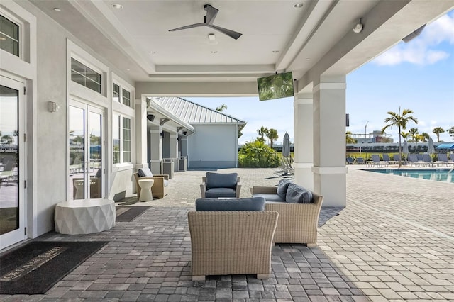 view of patio / terrace with ceiling fan and french doors