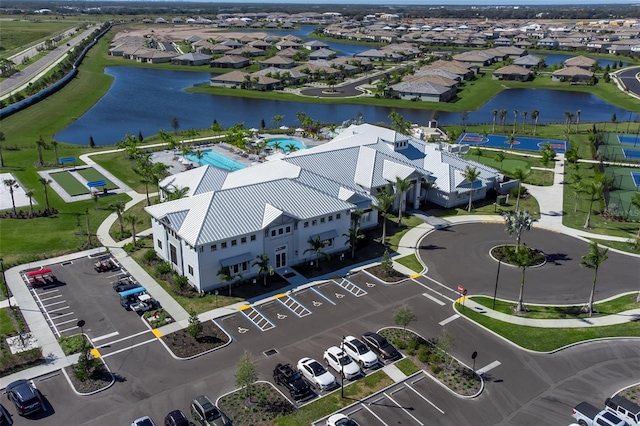 drone / aerial view featuring a water view