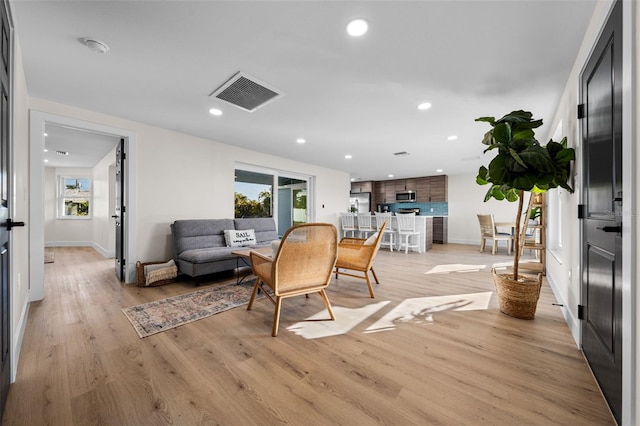 living room with light wood-type flooring