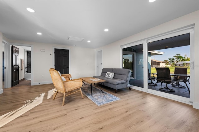 living room with light hardwood / wood-style floors