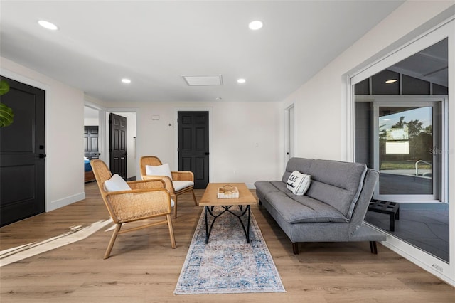 sitting room featuring light hardwood / wood-style flooring