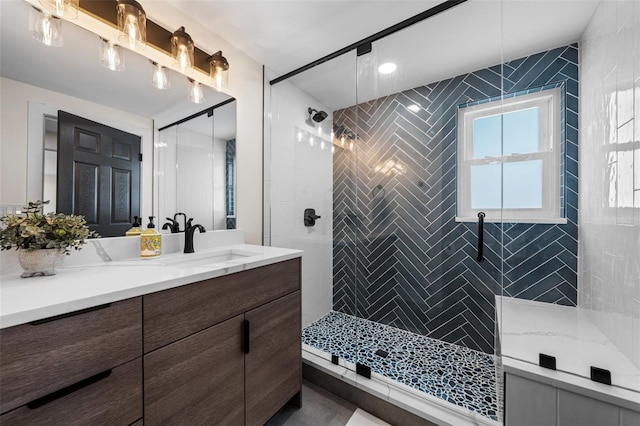 bathroom featuring vanity and walk in shower