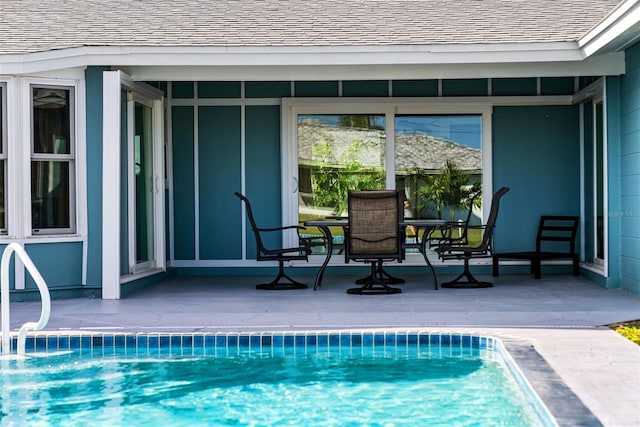 view of pool featuring a patio area