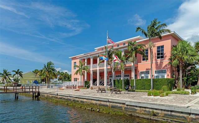 view of building exterior with a water view