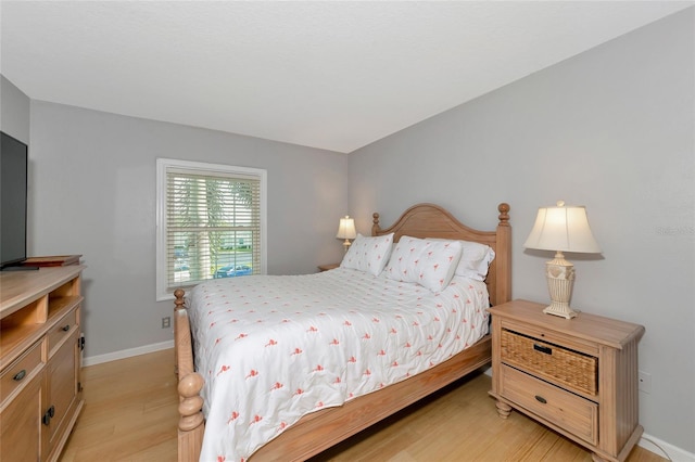 bedroom featuring light hardwood / wood-style floors