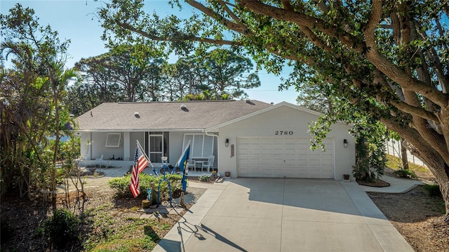 ranch-style home with a garage