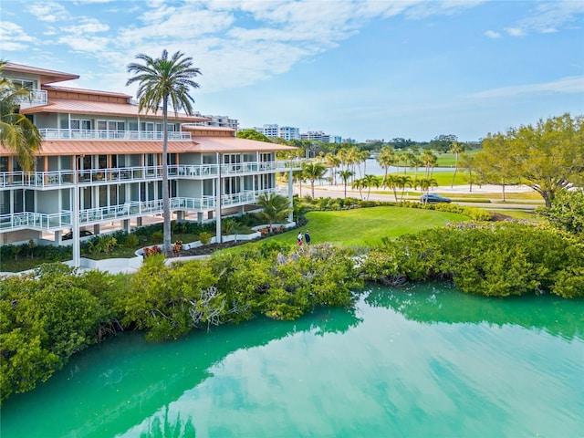 exterior space with a water view