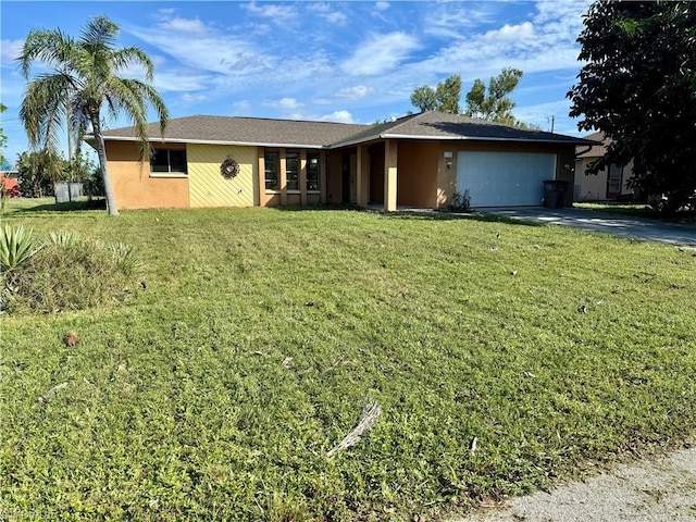 single story home featuring a garage and a front yard