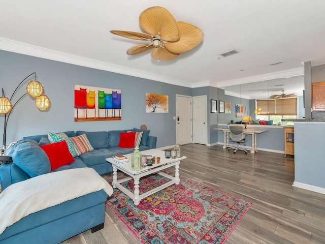 living room featuring crown molding, hardwood / wood-style flooring, and ceiling fan