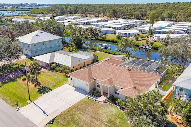 aerial perspective of suburban area featuring a large body of water