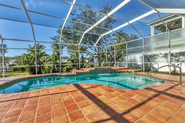swimming pool with a patio and a lanai