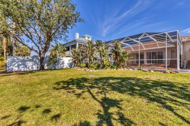 view of yard featuring a lanai