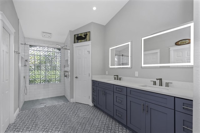 bathroom with an enclosed shower and vanity