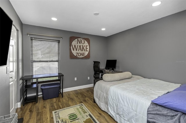 bedroom featuring dark wood-type flooring