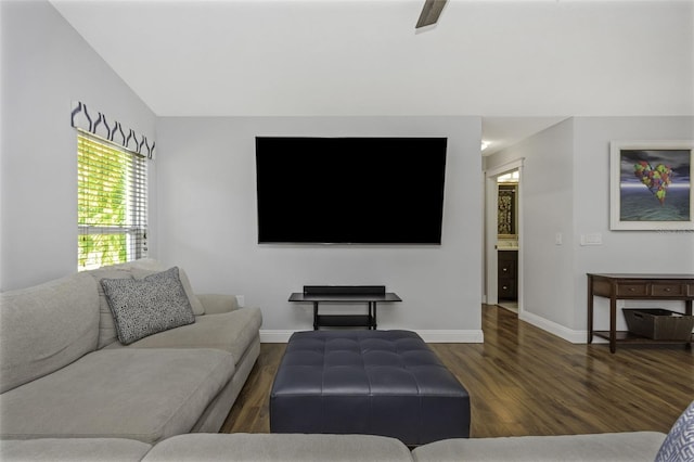 living room with vaulted ceiling, dark hardwood / wood-style floors, and ceiling fan