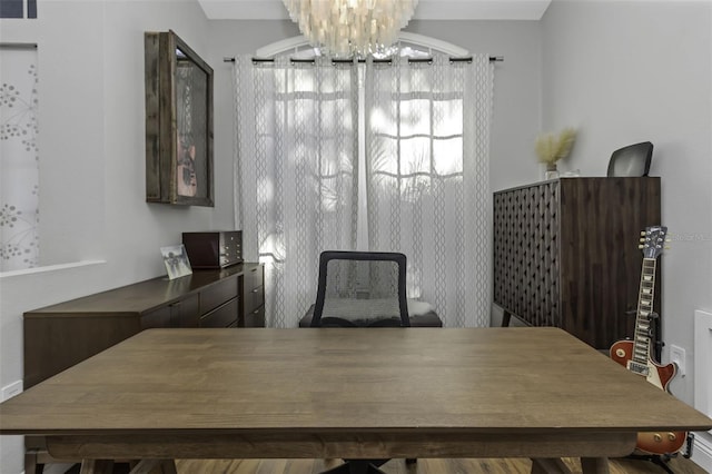 dining room featuring a chandelier