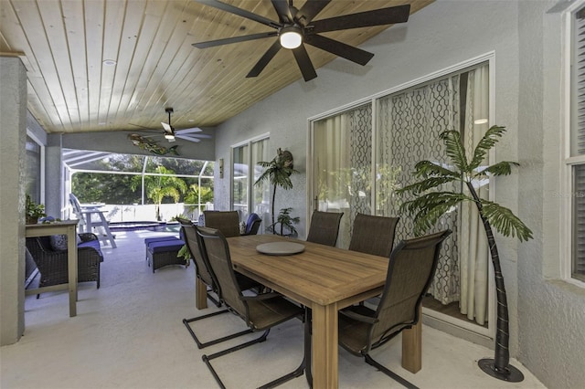 sunroom / solarium featuring vaulted ceiling and wooden ceiling