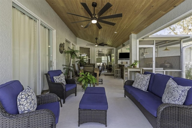 view of patio / terrace with an outdoor living space and ceiling fan