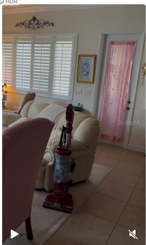 living room featuring light tile patterned flooring